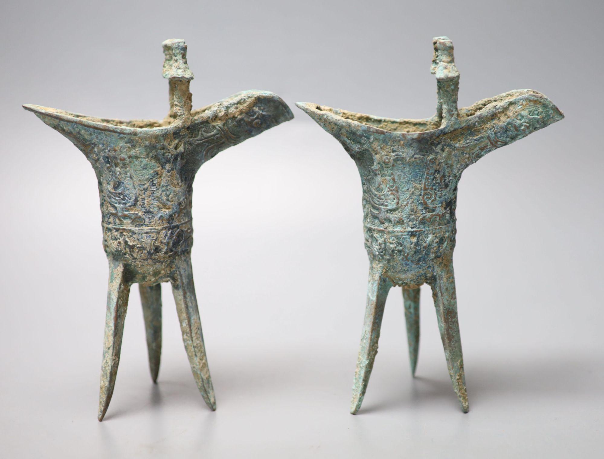 Two Chinese bronze archaistic tripod vessels, height 19cm